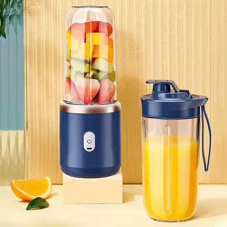 Portable Juicer Cup with Fresh Orange Juice